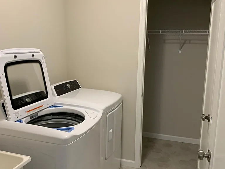Main Floor Laundry With Storage