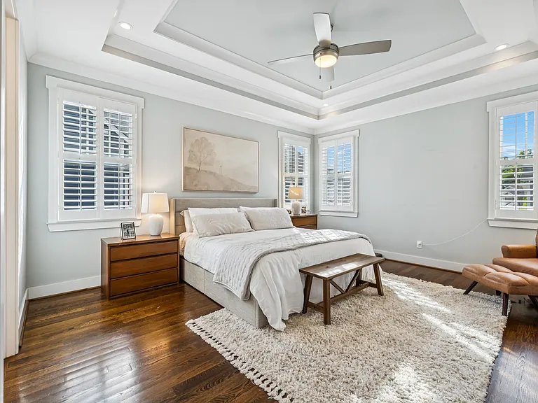 Primary bedroom with ensuite bath, walk-in closet and its own laundry area.