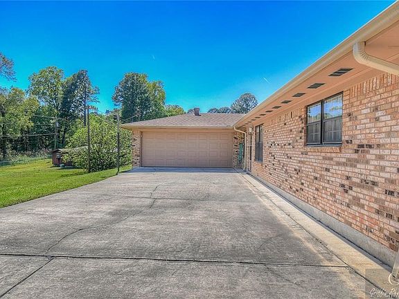 Enclosed  garage that is located in the back of the house with entry access into laundry/mud room.