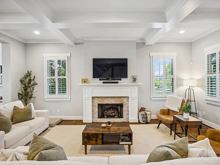Spacious living room with lots of natural light and comfortable seating for your group. Smart TV with all the streaming apps and a fireplace for cozy nights in.