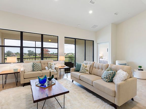 Gathering room with sliding glass door leading to lanai