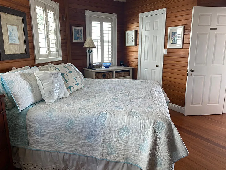 Master bedroom on 1st level with very comfortable king bed and full size washer and dryer in the master closet