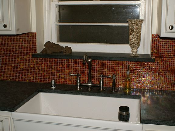 farmhose sink, glass tiles, custom faucet