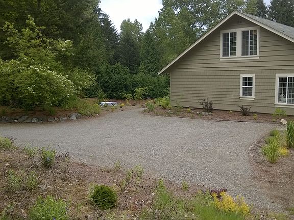 West side of house, parking