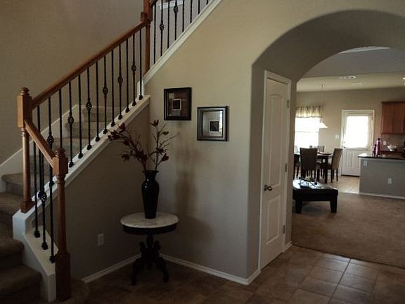 Photo of entry of model home of same plan