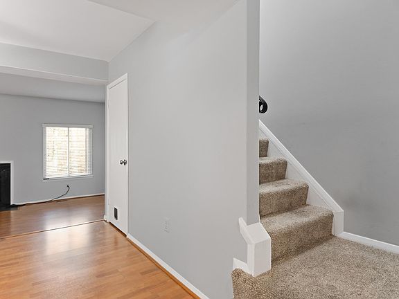 Carpeted stairs to the 2nd floor