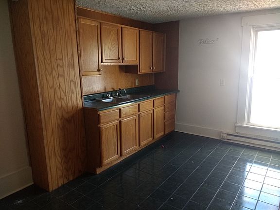 Upstairs kitchen side 1