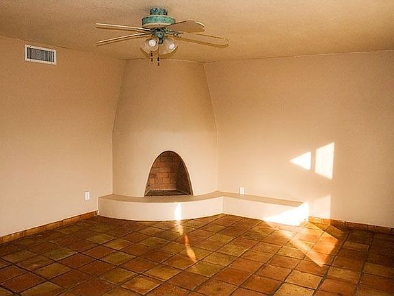 Vintage beehive wood burning fireplace in living room