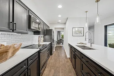 Kitchen provides easy access to butlers pantry and dining area and outside seating.