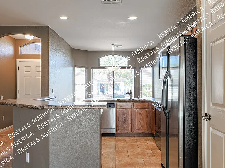 12823 W Modesto Dr — Photo 10