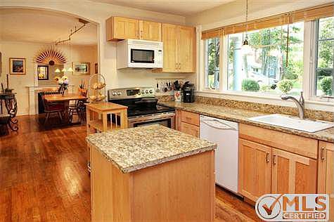 Kitchen with center island and dining room beyond