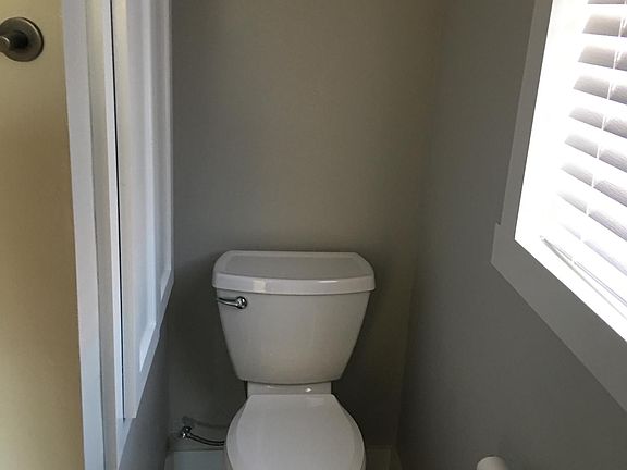 An oversized storage cabinet in the bathroom holds all the toiletries and linens with room for whatever else you want to tuck ou