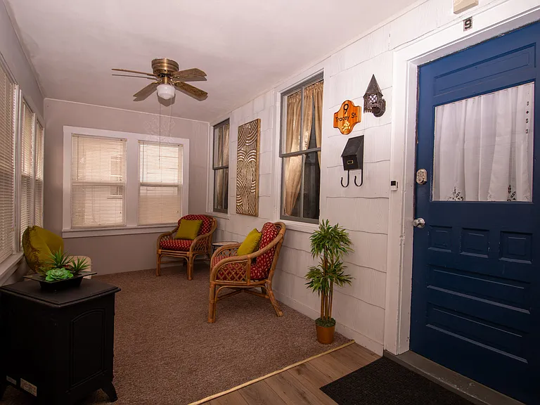 Enclosed porch, all mail and package deliveries are place in the enclosed porched