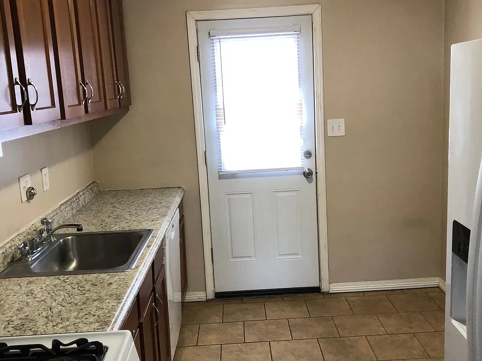 Backdoor of the apartment through kitchen