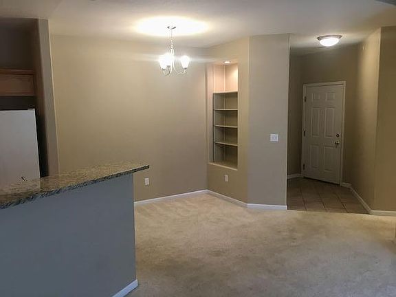 Entry and dining area; new wood planks will be installed