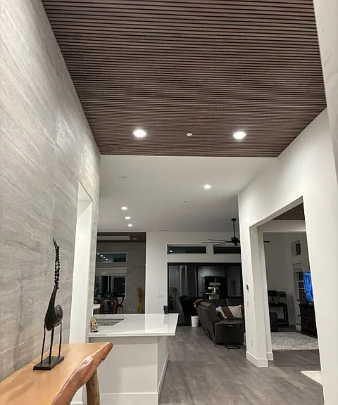 Foyer with 12ft ceiling with acoustic ceiling + custom 24"x48" stacked wall tile wall
