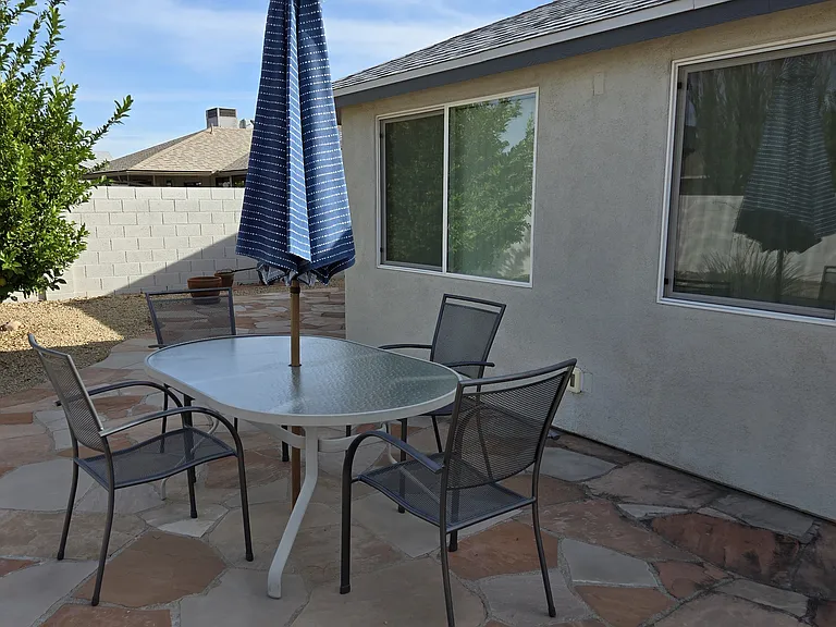 Backyard in the fenced yard with patio.
