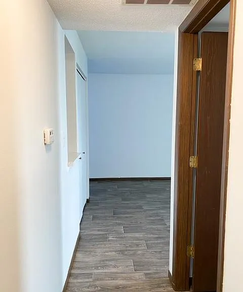 View of hall from utility closet.