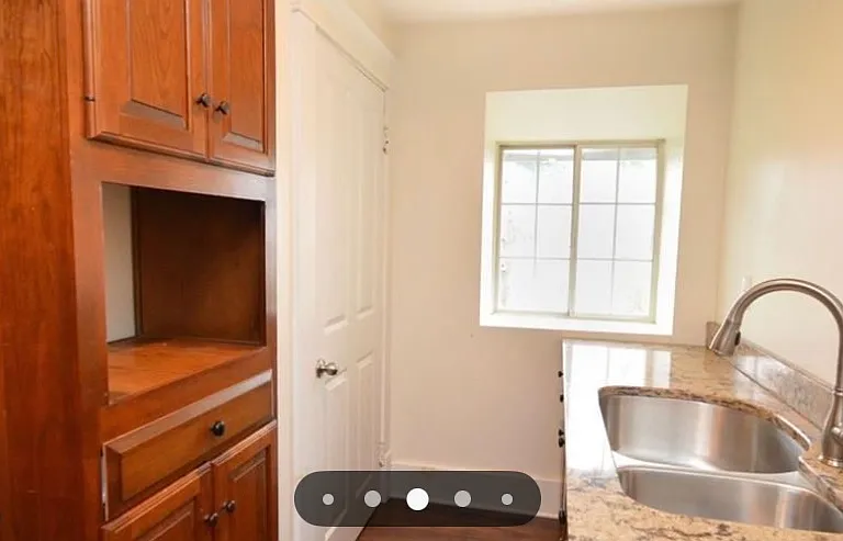 Galley Style Kitchen, Looking to put a window just above the sink to open the space up, will be complete by move in.