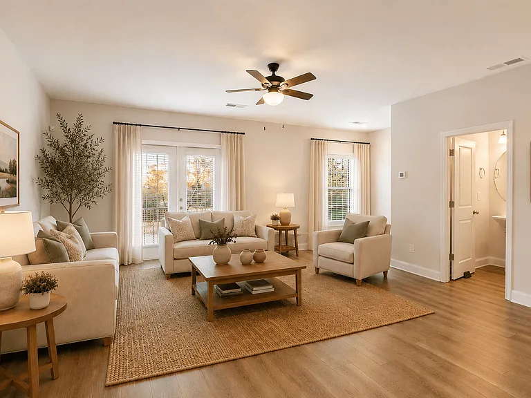 Spacious living room filled with abundant natural light.
