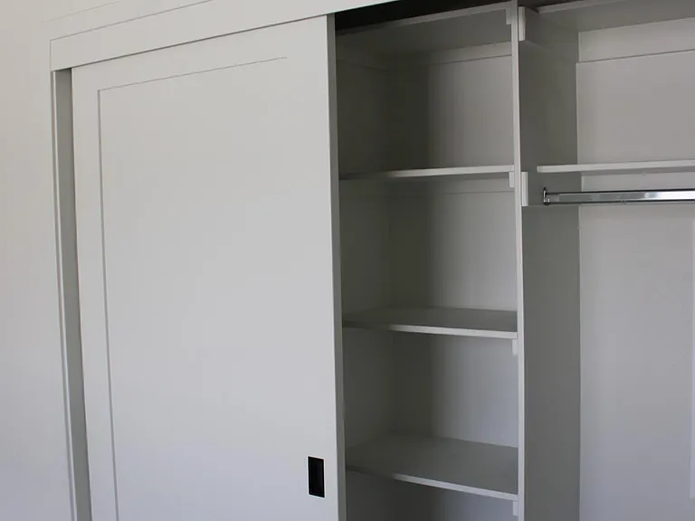 double door closet in three bedrooms
