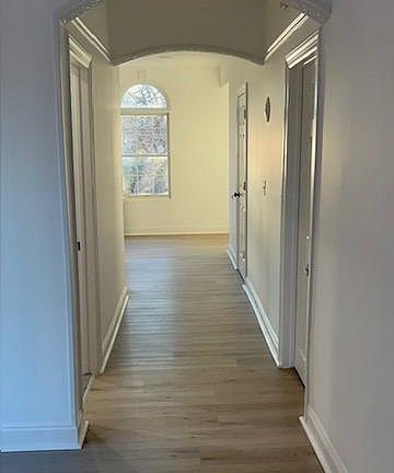 Hallway from living area toward kitchen