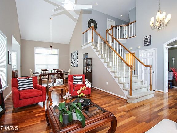 Vaulted Two Story Living and Dining room