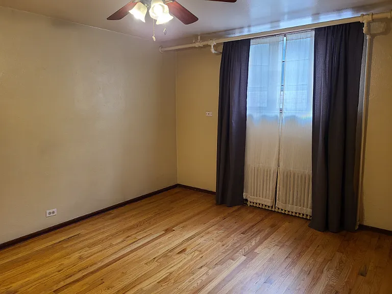 Living room with curtains.
