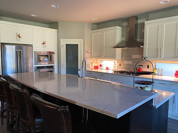 Kitchen and pantry. Eating bar. All kitchenaid appliances.