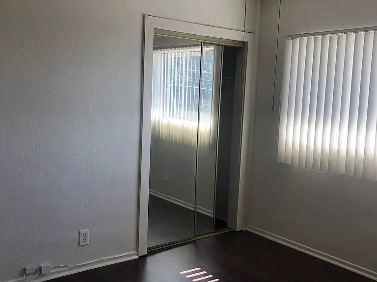 Master bedroom mirror closet doors.