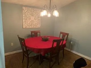 Dining room with same new floors