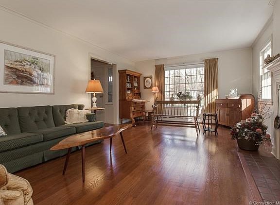 Oversized windows (with newer storm windows) create bright living spaces.