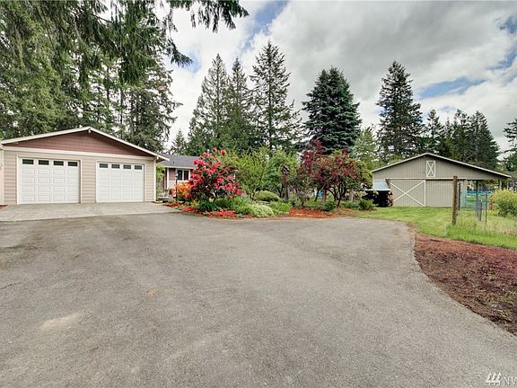 This delightful rambler offers single story living with three bedrooms and 2 baths on the upper floor PLUS a full basement below. All sitting on over 2 acres of land with a large barn, pasture and corral.