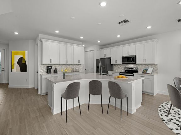 Kitchen with designer finishes and stainless steel appliances