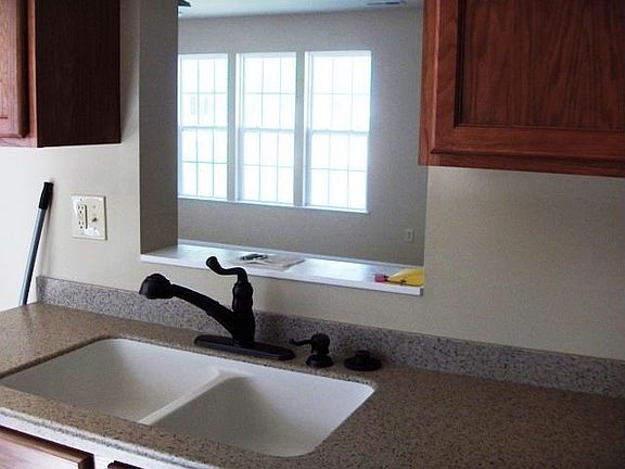 cut out in kitchen into living room