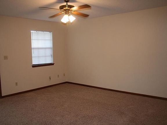 Large Bedroom with door leading to back