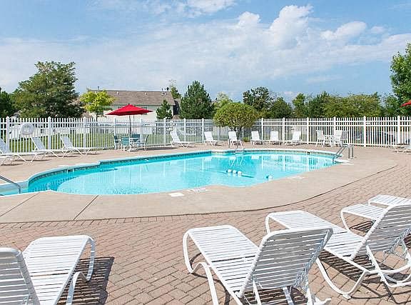 Pool and Pool Deck with Lounge Chairs & Tables