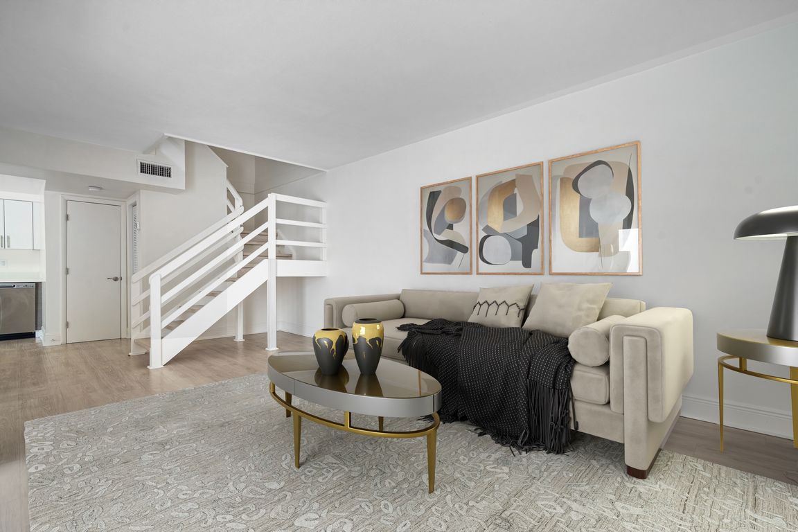 Enjoy a spacious living room in yout two story townhome