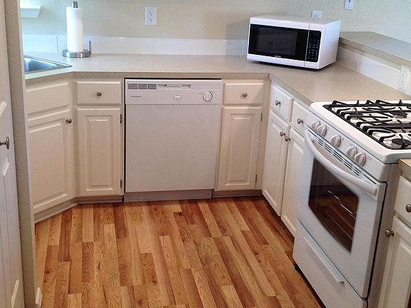 Kitchen counters and gas range. Microwave is provided