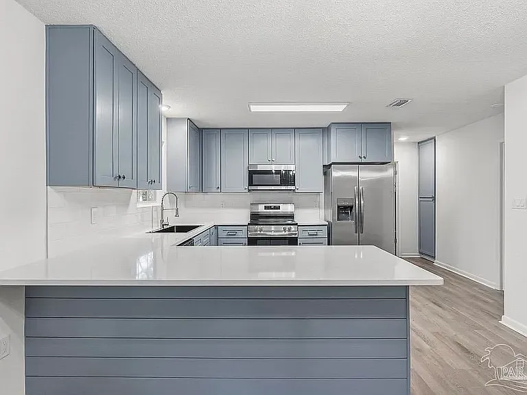 910 Whisperwood Ln S — Photo 14