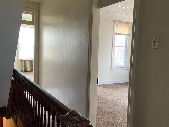 Hallway leading to Kitchen, living room, and 1st bedroom