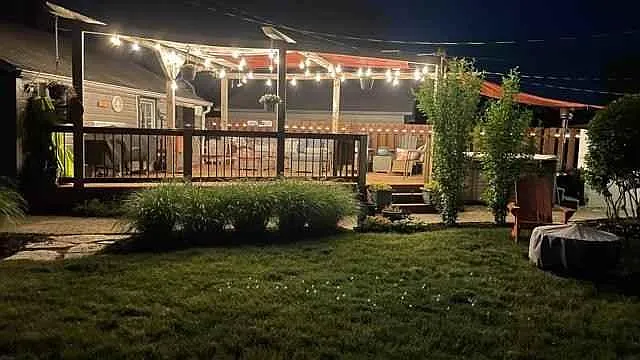 Large deck with Jacuzzi, outdoor TV, speakers and pergola