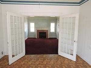 DINING ROOM LOOKING INTO FRONT LIVING ROOM WITH FI