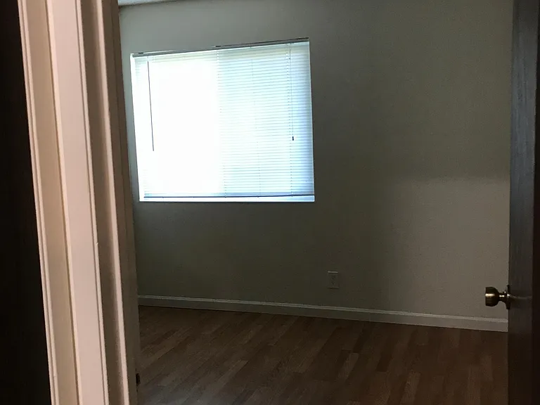 1st guest room with a large window