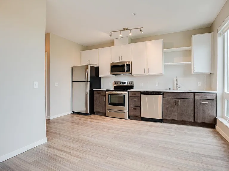 Our open-concept living spaces are designed for modern living, with high-end finishes and thoughtful details.