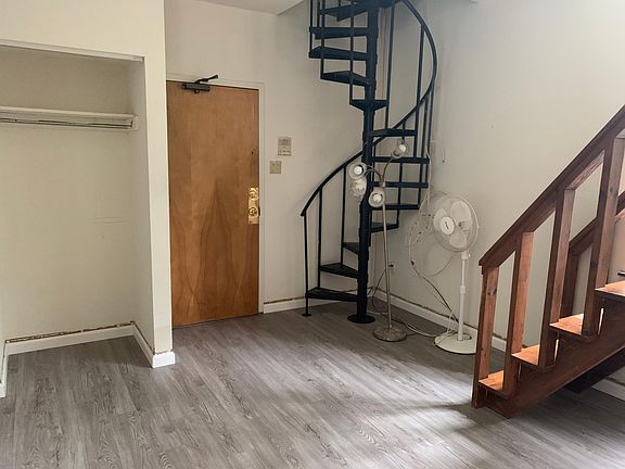 Spiral staircase to the bedroom and second bathroom
