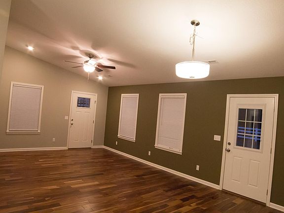 View from kitchen showing front and side doors