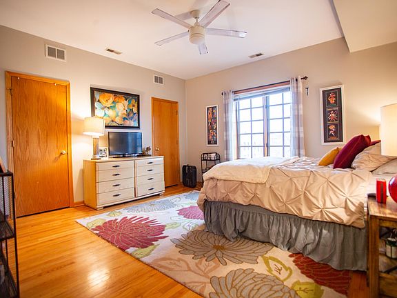 Master bedroom with 2 walk in closets