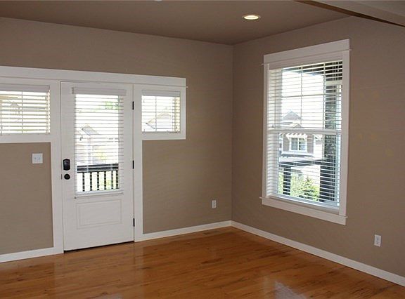 Craftsman style home with custom features throughout.  Front door opens to real hardwood floors, high ceilings and painted trim.