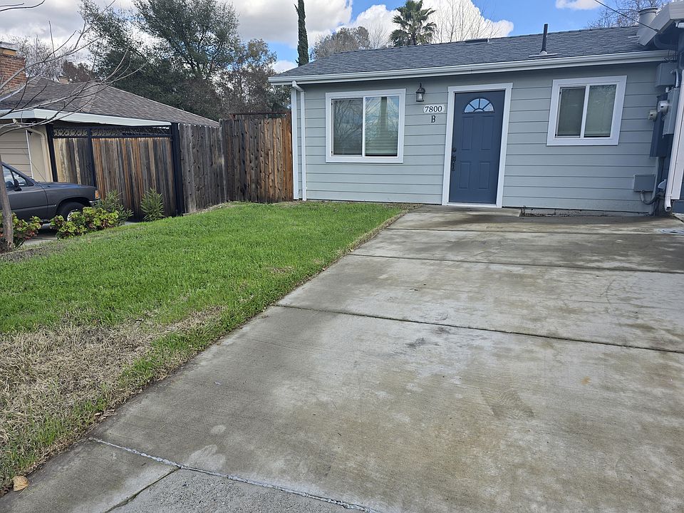 Charming rental with spacious driveway. The Fence on the left has been replaced. Features motion-sensor or constant exterior lighting for security.